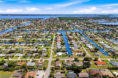 BOATER'S PARADISE WITH DIRECT GULF ACCESS! This beautifully - photo 1