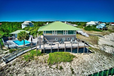 *Front Row* is one of the most breath-taking gulf front homes on - photo 1