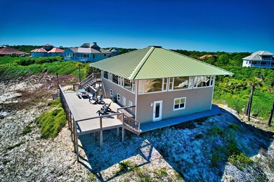 *Front Row* is one of the most breath-taking gulf front homes on - photo 8
