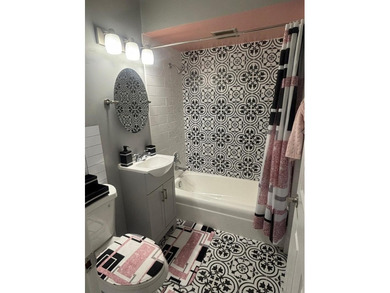 Tastefully upgraded fully furnished Elmwood Park Studio Condo on