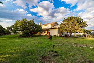 Just under 4,000 sq ft of refined luxury, this 4 bed, 3 full + 2 - photo 2