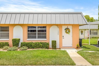 Bright, Move-In-Ready Condo with Florida Room & Resort-Style 55+ - photo 1