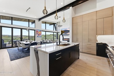 Situated within the gated community of Tuhaye, this custom - photo 11