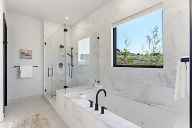 Situated within the gated community of Tuhaye, this custom - photo 20