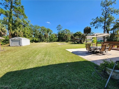 Tucked away in the heart of Golden Gate Estates, this warm and - photo 2