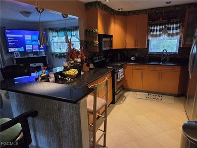 Tucked away in the heart of Golden Gate Estates, this warm and - photo 4