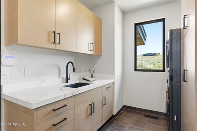 Situated within the gated community of Tuhaye, this custom - photo 26