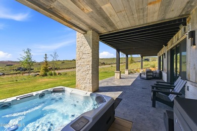 Situated within the gated community of Tuhaye, this custom - photo 41