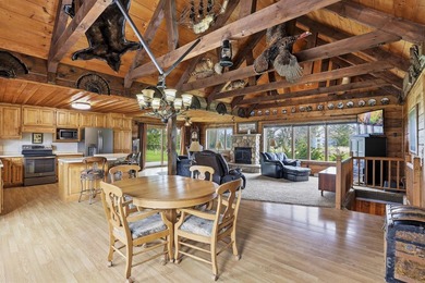 Step inside this rare beauty featuring vaulted ceilings, exposed - photo 5