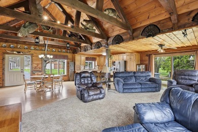 Step inside this rare beauty featuring vaulted ceilings, exposed - photo 7