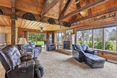 Step inside this rare beauty featuring vaulted ceilings, exposed - photo 8