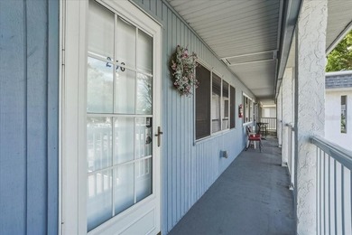 Welcome to this beautifully maintained second-floor condominium - photo 3