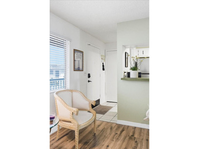 Welcome to this beautifully maintained second-floor condominium - photo 4