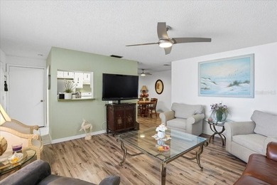 Welcome to this beautifully maintained second-floor condominium - photo 7