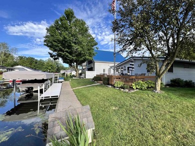 Enjoy lake life in this charming 2-bedroom, 1-bath home with 50 - photo 1