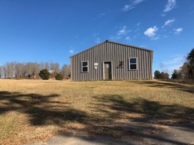 Amazing opportunity to purchase this off water Morton shop - Lake Home For Sale in Crane Hill, Alabama
