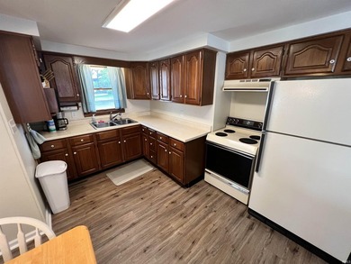 Enjoy lake life in this charming 2-bedroom, 1-bath home with 50 - photo 2