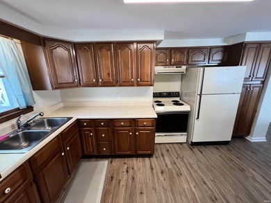 Enjoy lake life in this charming 2-bedroom, 1-bath home with 50 - photo 3