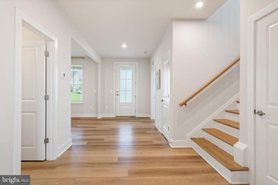Welcome to this 24-month-old single-family home in the highly - photo 6