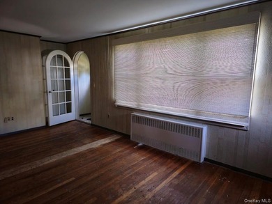 Charming Two Family Home. Livingroom With Fireplace, Dining Room - photo 3