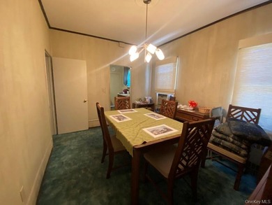 Charming Two Family Home. Livingroom With Fireplace, Dining Room - photo 4