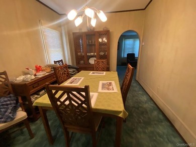 Charming Two Family Home. Livingroom With Fireplace, Dining Room - photo 5