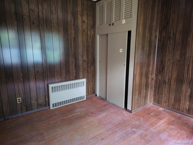 Charming Two Family Home. Livingroom With Fireplace, Dining Room - photo 8