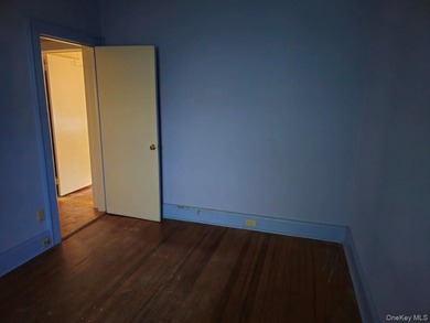 Charming Two Family Home. Livingroom With Fireplace, Dining Room - photo 9
