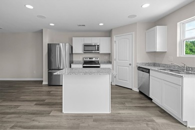Welcome to 115 Adger Road, a beautifully maintained townhome in - photo 11