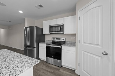 Welcome to 115 Adger Road, a beautifully maintained townhome in - photo 12