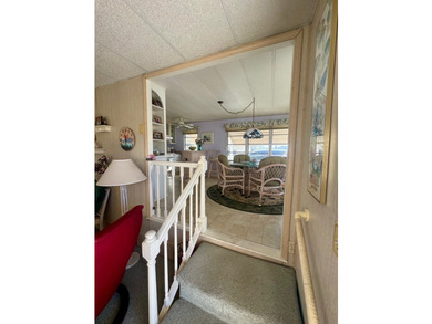 A charming mobile home is now for sale in the unique 55+ - photo 3