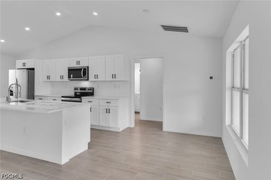 NEW CONSTRUCTION WITH IMPACT WINDOWS IN NW CAPE CORAL! Welcome - photo 7