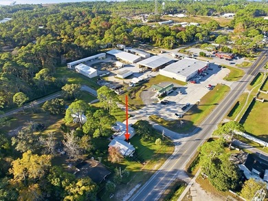 Discover a rare mixed-use property offering endless - photo 5