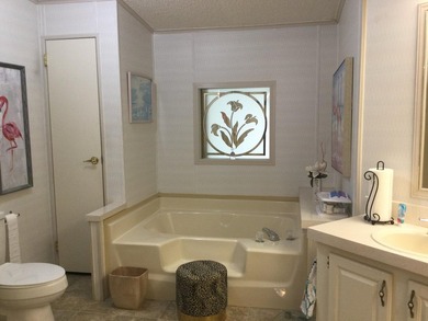 ONE OF THE LARGEST HOMES IN THIS COMMUNITY. THIS 1560 SF HOME IS - photo 20
