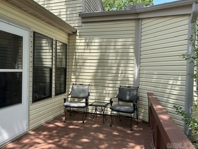 Enjoy this partially furnished condo tucked among the trees - photo 1
