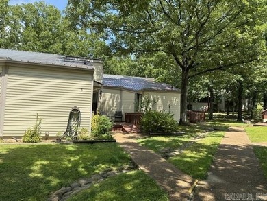 Enjoy this partially furnished condo tucked among the trees - photo 2