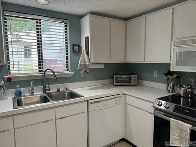 Enjoy this partially furnished condo tucked among the trees - photo 3