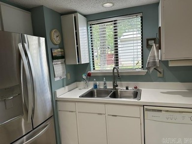 Enjoy this partially furnished condo tucked among the trees - photo 6
