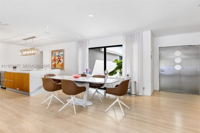 Nestled on one of Miami Beach's most exclusive streets, this - photo 11