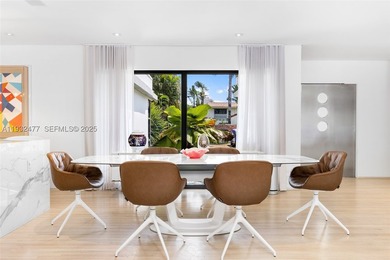 Nestled on one of Miami Beach's most exclusive streets, this - photo 12