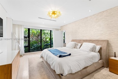 Nestled on one of Miami Beach's most exclusive streets, this - photo 13