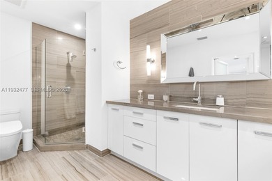 Nestled on one of Miami Beach's most exclusive streets, this - photo 15