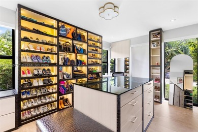 Nestled on one of Miami Beach's most exclusive streets, this - photo 17