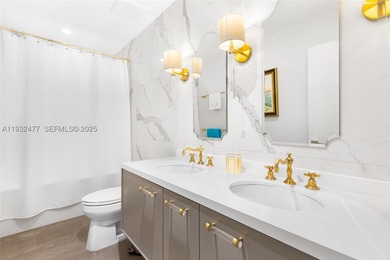 Nestled on one of Miami Beach's most exclusive streets, this - photo 19