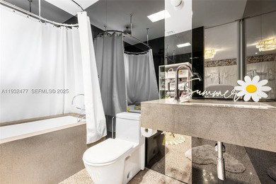 Nestled on one of Miami Beach's most exclusive streets, this - photo 23