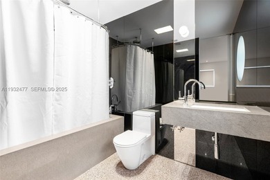 Nestled on one of Miami Beach's most exclusive streets, this - photo 26