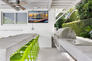 Nestled on one of Miami Beach's most exclusive streets, this - photo 28