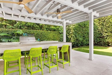 Nestled on one of Miami Beach's most exclusive streets, this - photo 29