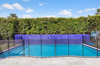 Nestled on one of Miami Beach's most exclusive streets, this - photo 32
