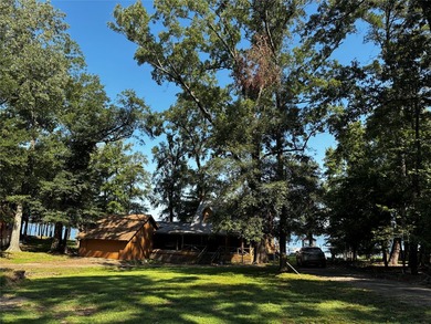 Rustic Lakefront Log Home with Stunning Sunsets No HOA - photo 9